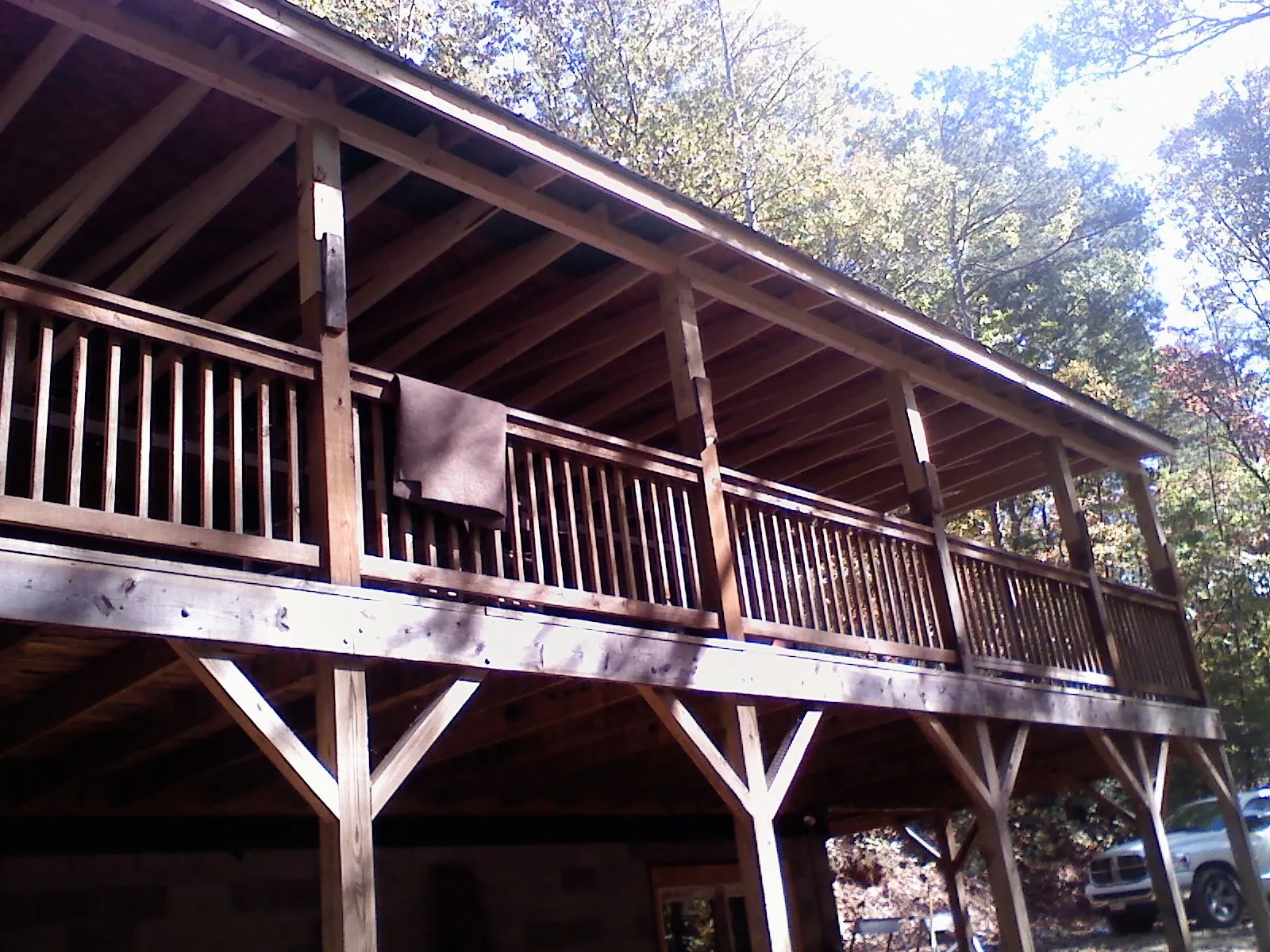 Timber framing under a new elevated porch and deck — Roof Leak Repair in Brandon by Roofing Brothers